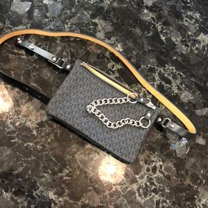 Black Michael Kors pull chain belt bag.
